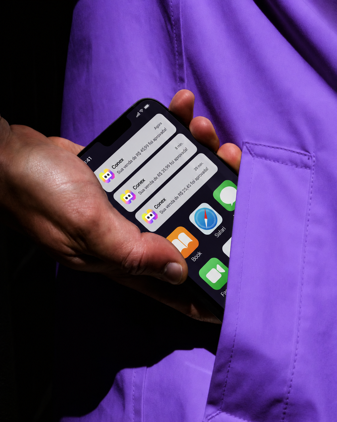 Hand holding a phone